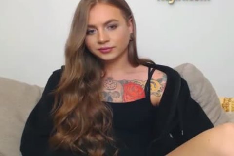 Tattooed ladyboy Jerks Off
